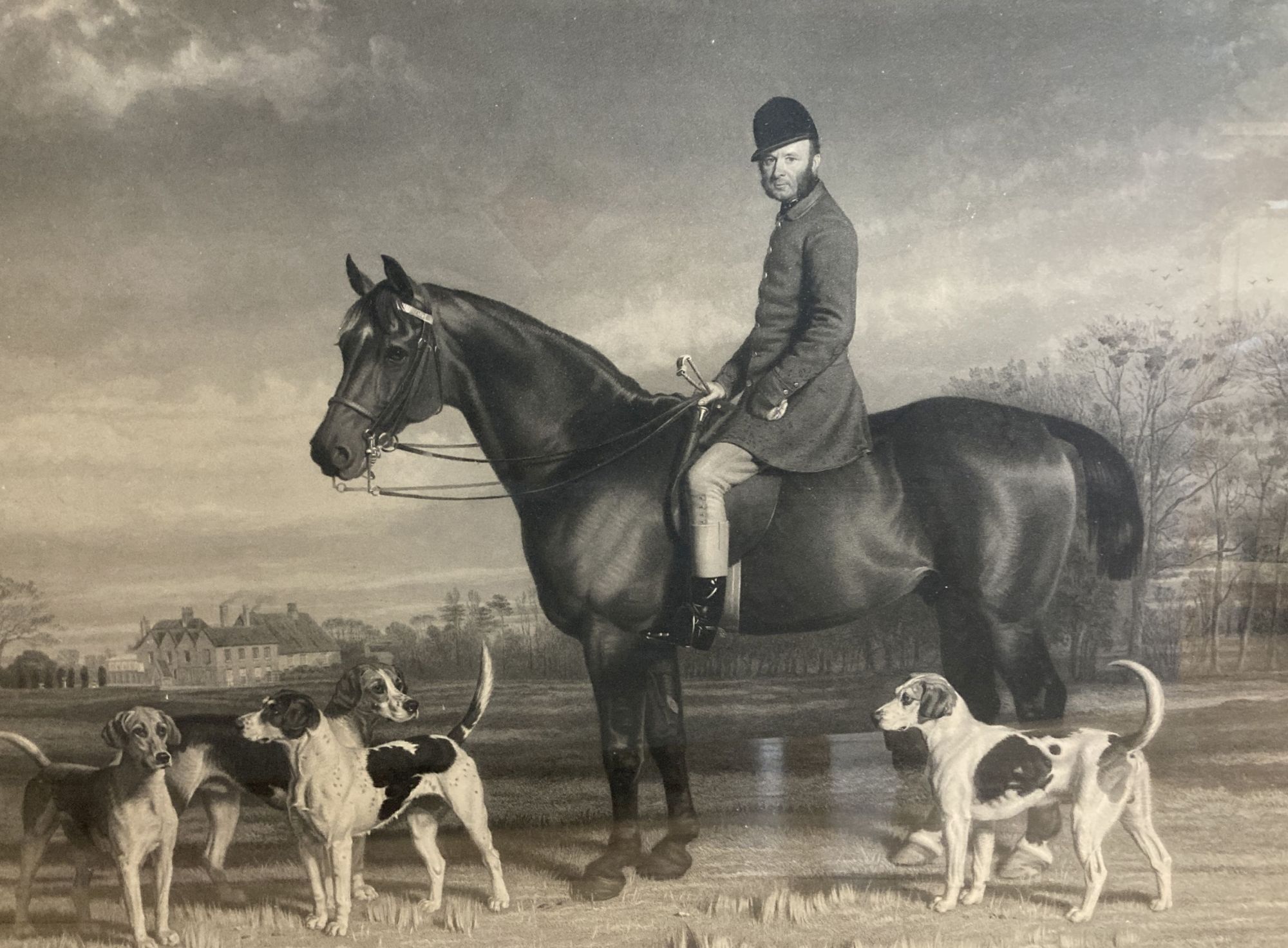 A Victorian maple framed engraving of a huntsman and hounds, 68 x 86cm